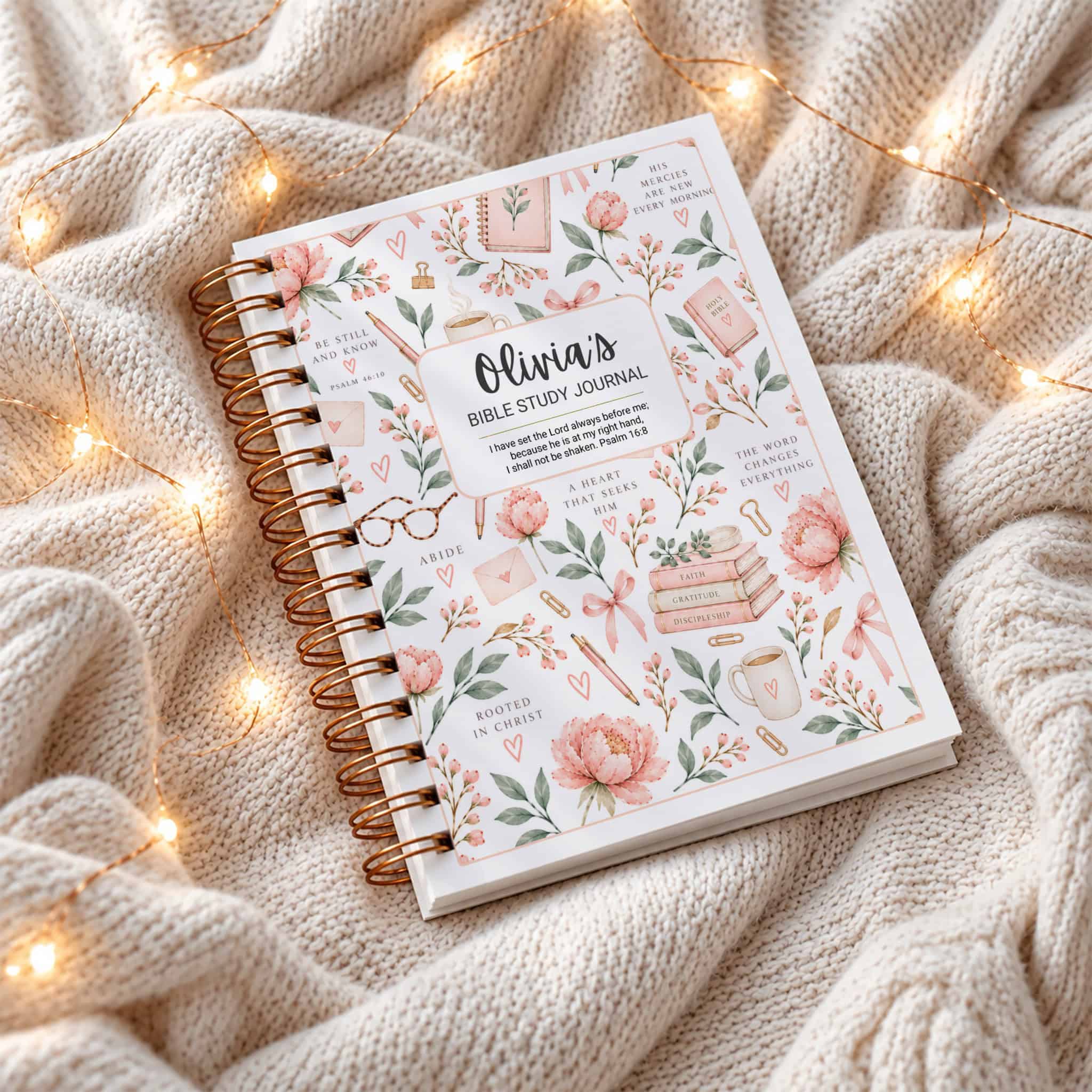 Personalized Bible Study Journal on a white blanket with lights
