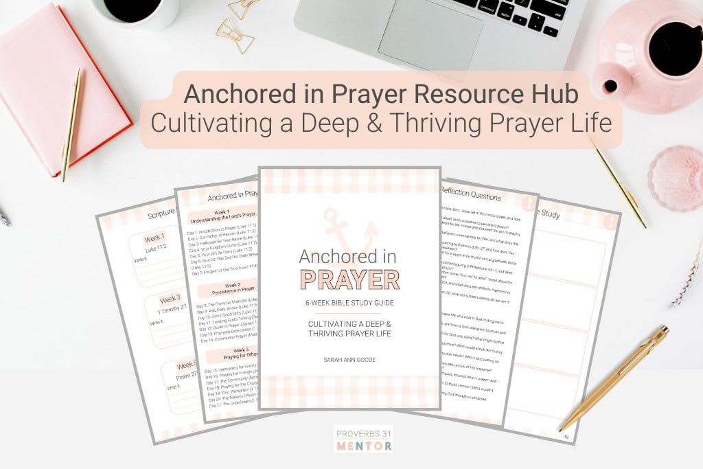 Anchored in Prayer Resource Hub image Anchored in Prayer Resource Hub Picture- a styled desk with a computer and pink tea pot and the free Anchored in Prayer Bible Reading Plan on it